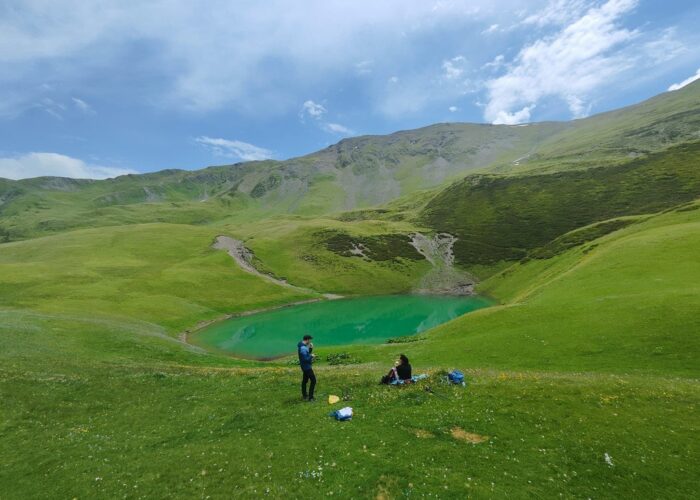 Hikers at Lake Oreti during trekking in Georgia