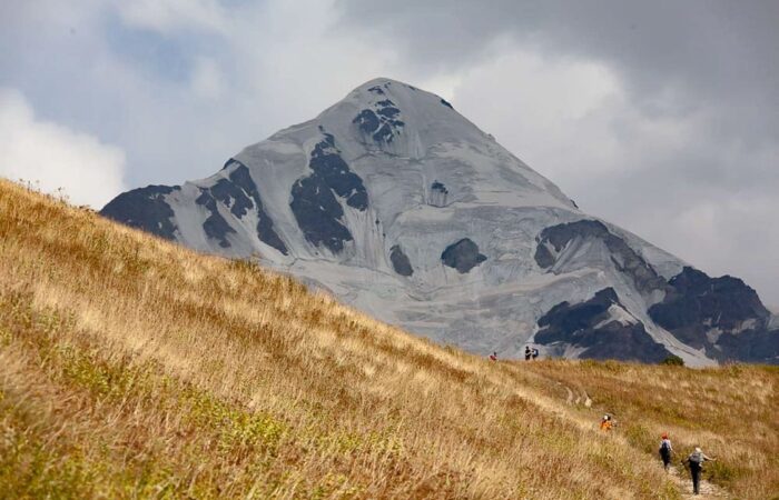 Hikers on the Chchutnieri Pass hiking from Mestia to Ushguli