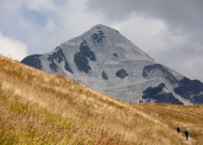 Hikers on the Chchutnieri Pass hiking from Mestia to Ushguli